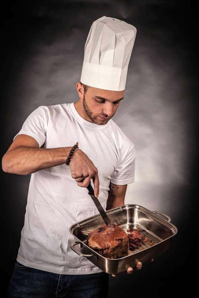 Photo by 752910 man, cook, cooking, cut, food, meat, pan, preparation, gourmet, chef, chef hat, kitchen, portrait, cook, cooking, chef, chef, chef, chef, chef